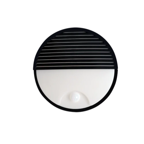 Round wall light fixture with black grill