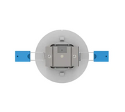 A top-down view of a recessed LED light fixture base with a gray circular backplate, a central gray metal heat sink, and two blue terminal blocks on either side, shown on a plain white background.